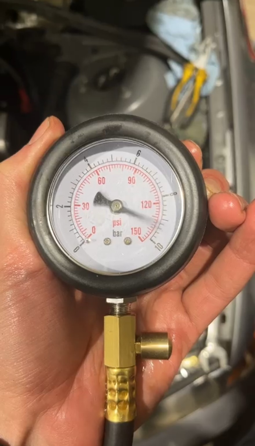 Oil pressure gauge used during BMW E46 N46 diagnosis